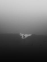 Load image into Gallery viewer, Black and white surf art captured on a misty day on the Scheveningen coastline. Available as art print.
