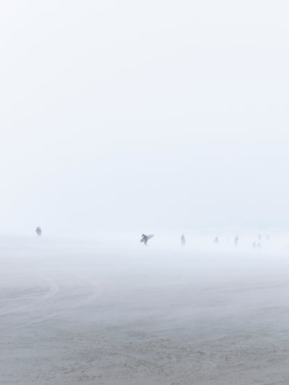 Photo print of a surfer on the Scheveningen beach during winter.