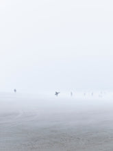 Load image into Gallery viewer, Photo print of a surfer on the Scheveningen beach during winter.
