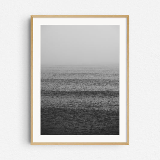 Black and white surf photography from the dutch coast in a natural wooden frame.