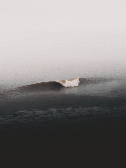 Photo of a single wave breaking in the Dutch part of the North Sea.