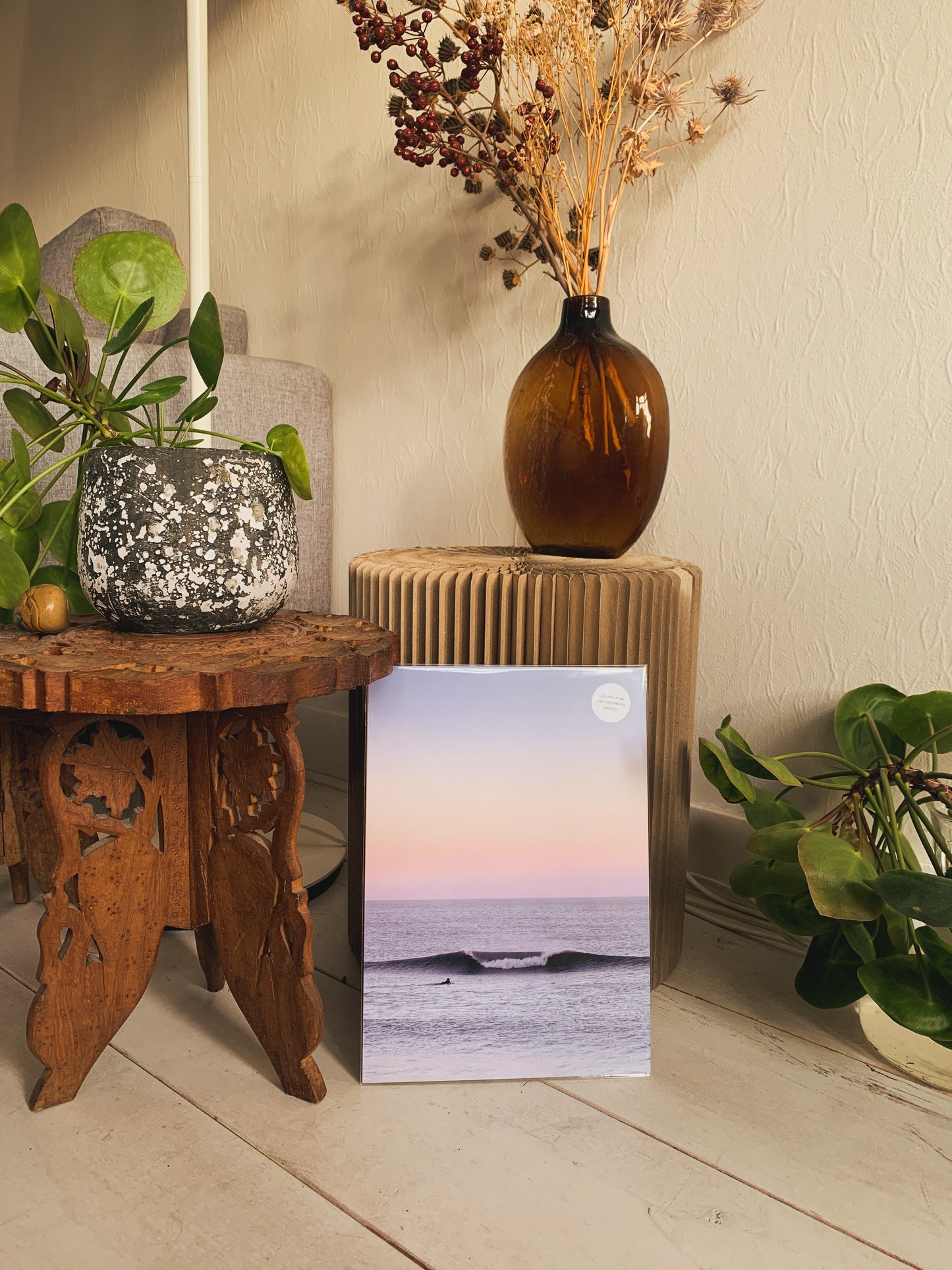 A pastel photo print of a surfer during sunset in Scheveningen.