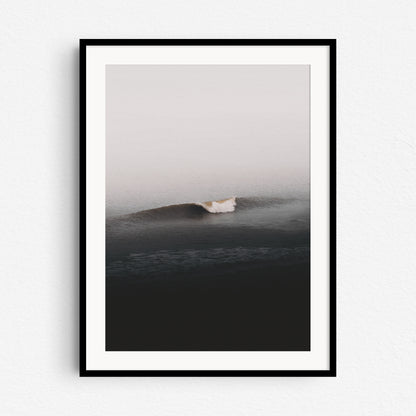 Wave photography from The Netherlands in a black wooden frame.