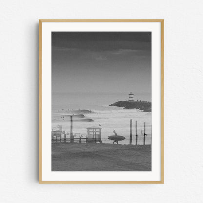 Double exposure surf photography in black and white, in a natural wooden frame.