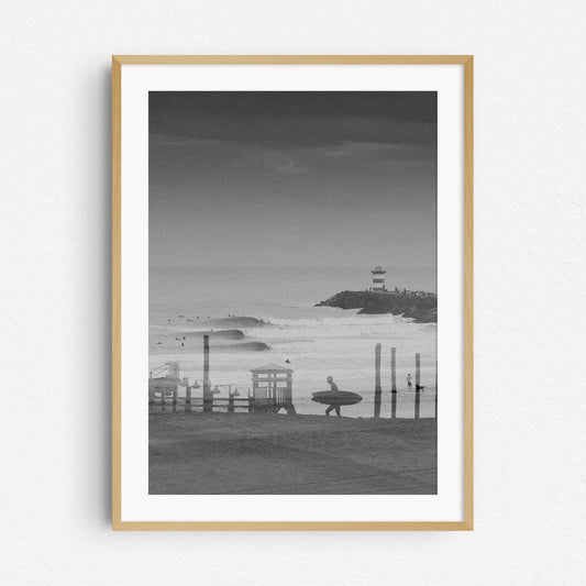 Double exposure surf photography in black and white, in a natural wooden frame.