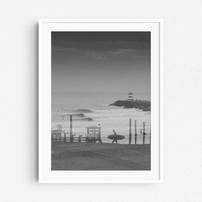 Black and white North Sea surf photography in a white wooden frame.