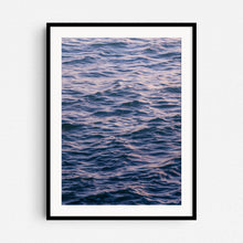 Load image into Gallery viewer, Close up of the pastel coloured North Sea surface in a black wooden frame.
