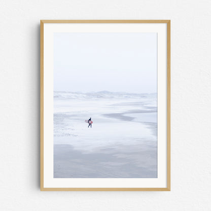 Winter surf photography in The Netherlands. A photo print in a natural wooden frame.