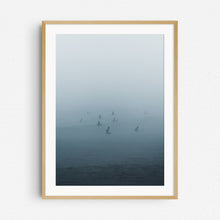 Load image into Gallery viewer, Surfers in the North Sea waiting for waves in thick fog. Photo print in a natural wooden frame.
