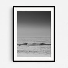 Load image into Gallery viewer, Two surfers paddle towards a broken wave in the North Sea, captured by Jop Hermans.
