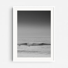 Load image into Gallery viewer, Two surfers paddle towards a broken wave in the North Sea, captured by Jop Hermans.
