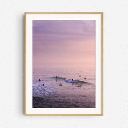 Summer surfing in The Hague captured by Jop Hermans, photo print in a natural wooden frame.