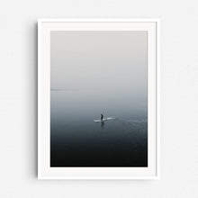 Load image into Gallery viewer, The calming silhouette of a surfer in the North Sea, framed in white wood, a peaceful addition for North Sea Surf Photos lovers.
