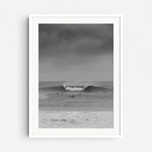 Load image into Gallery viewer, A framed surf photograph of surfers in the Netherlands paddling towards a large wave, captured by Jop Hermans.
