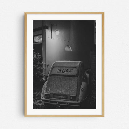 Surf car in the snow in Scheveningen. Framed in natural wood, captured by Jop Hermans.