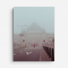 Load image into Gallery viewer, Surfer in front of the Kurhaus Hotel in The Hague, walking in the mist. Printed on dibond.
