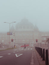 Load image into Gallery viewer, Surfer in front of the Karhaus Hotel in The Hague. A retro vibe, captured by Jop Hermans.
