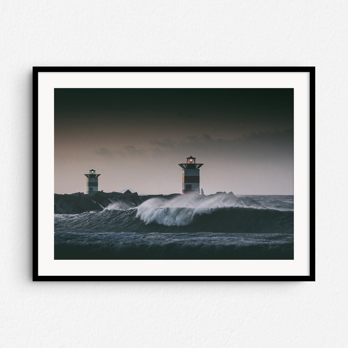 Dark and moody photography at the North Sea coast, captured by Jop Hermans, framed in black wood.