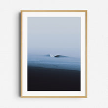 Load image into Gallery viewer, A clean, curling wave on a moody day in Scheveningen. Ocean artwork framed in natural wood for an organic, coastal vibe.
