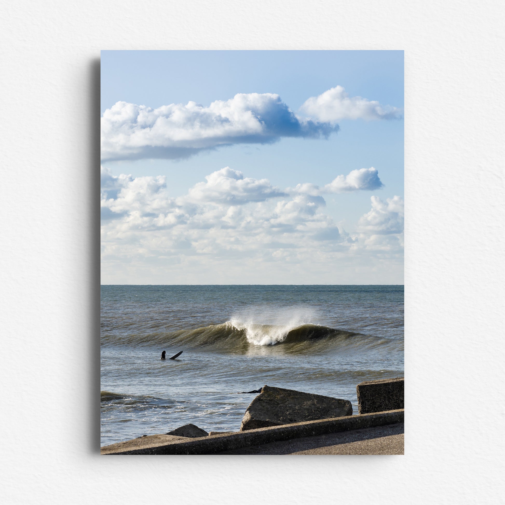 Dibond print of a surfer in front of North Sea wave on a fresh and sunny day in The Hague.