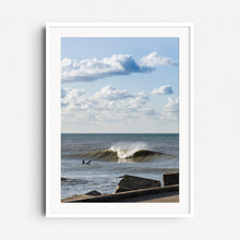 Load image into Gallery viewer, Dutch surf scene under classic skies, framed in white wood to emphasize the fresh, clear atmosphere of the photo. Captured by Jop Hermans.
