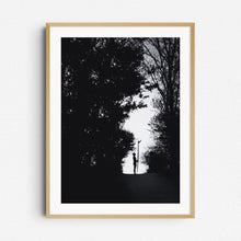 Afbeelding in Gallery-weergave laden, Silhouette of a female surfer with a longboard in a forest, framed in natural wood, a beautiful piece for Nature Photography lovers.
