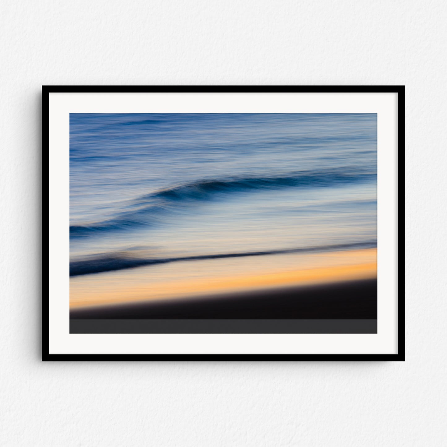 Surf art of The Hague in a black wooden frame. Captured by Jop Hermans