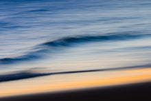 Load image into Gallery viewer, Moving water on the dutch shoreline photographed with a long shutter speed, giving it a cloudy effect.
