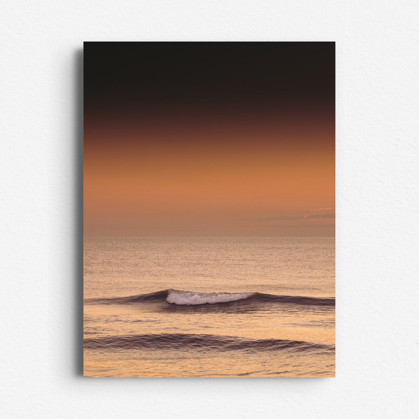 Minimalist wave at golden sunset on the North Sea, printed on Dibond. Stunning surf photography for modern walls.