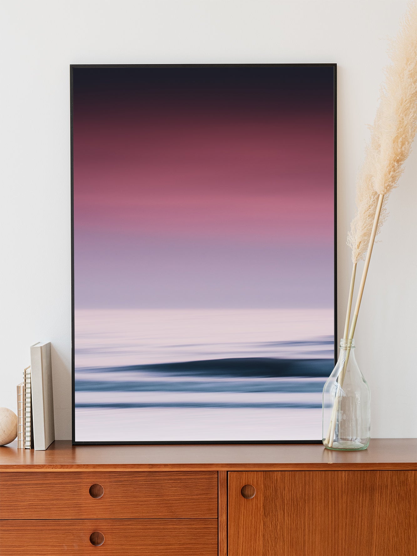 A vibrant abstract sea photo with purple tones and dreamy waves. Poster framed in sleek aluminum for striking, durable wall art.