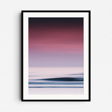 Load image into Gallery viewer, A vibrant abstract sea photo in purple hues. Long exposure adds a dreamy feel. Framed in black wood for bold, modern wall art.
