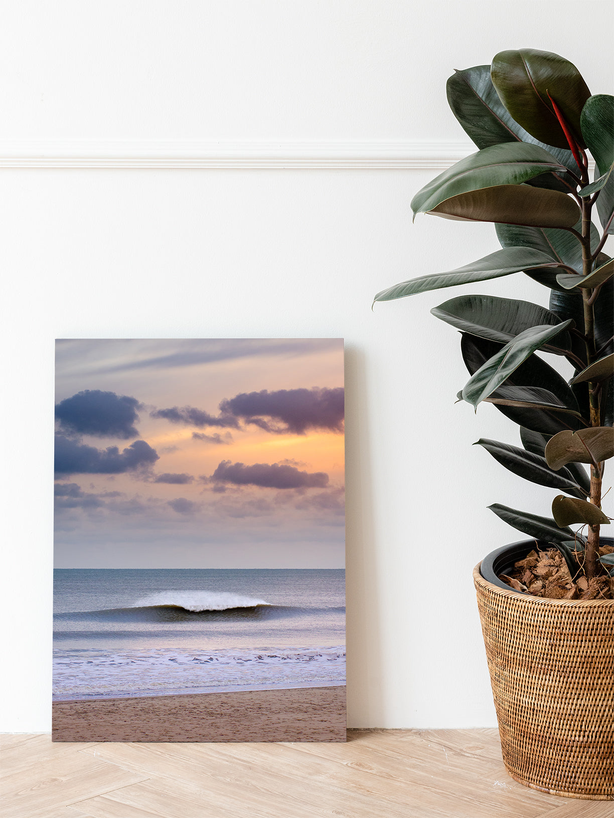 A vibrant North Sea wave breaks with spray under an orange sky. Printed on aluminum Dibond, durable artworkwith natural beauty.