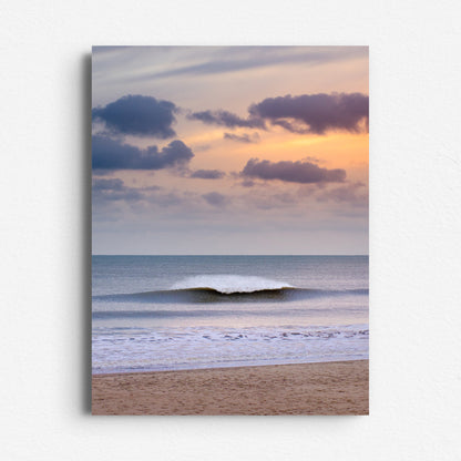 A glowing sky and clean North Sea wave with vibrant spray. Printed on Dibond for sleek, modern wall art that transforms your space.