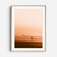 Load image into Gallery viewer, A surfer walks back from a surf session in the North Sea. Nature photography from The Netherlands framed in natural wood. Captured by Jop Hermans
