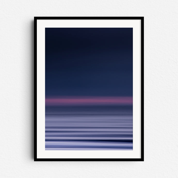 Abstract North Sea art in purple hues, framed in black wood. Captures the sunset with panning technique for modern home decor.