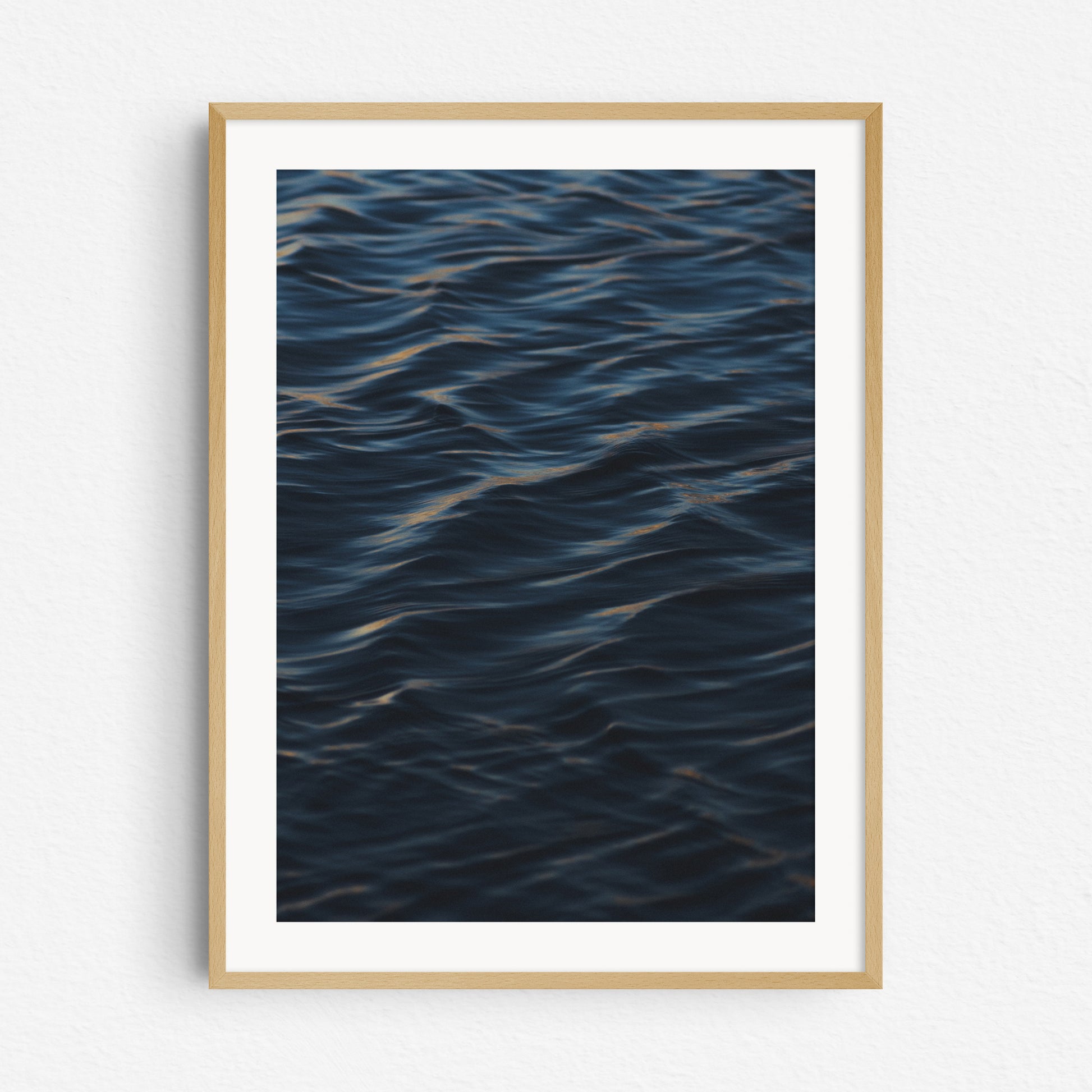 The North Sea ocean surface in a natural wooden frame.