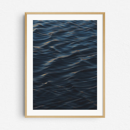 The North Sea ocean surface in a natural wooden frame.