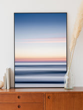 Load image into Gallery viewer, Vibrant North Sea sunset with blue and orange tones, printed on aluminum Dibond. A striking piece for contemporary wall art.
