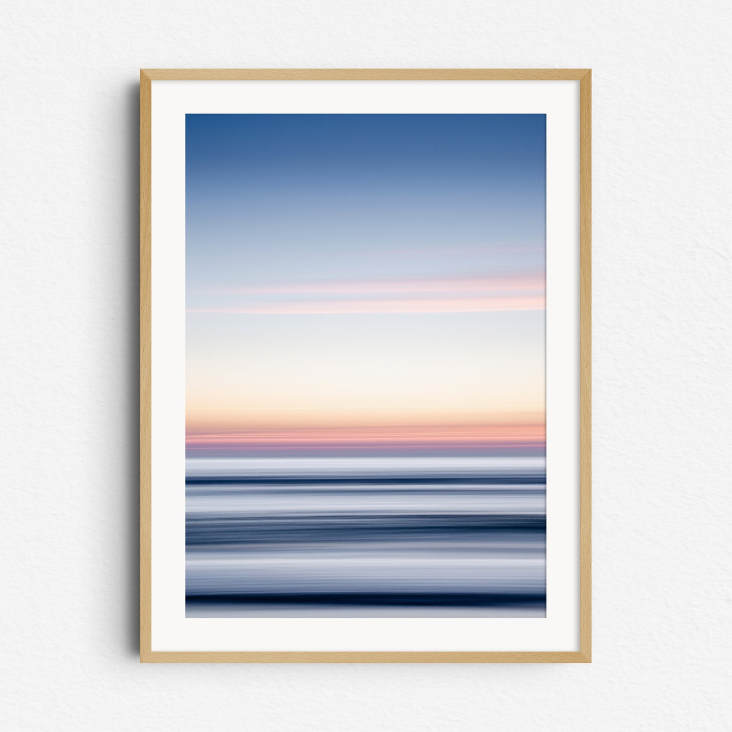 "Spring" – vibrant sunset over the North Sea, framed in natural wood. Ideal for nature lovers and fresh coastal vibes.