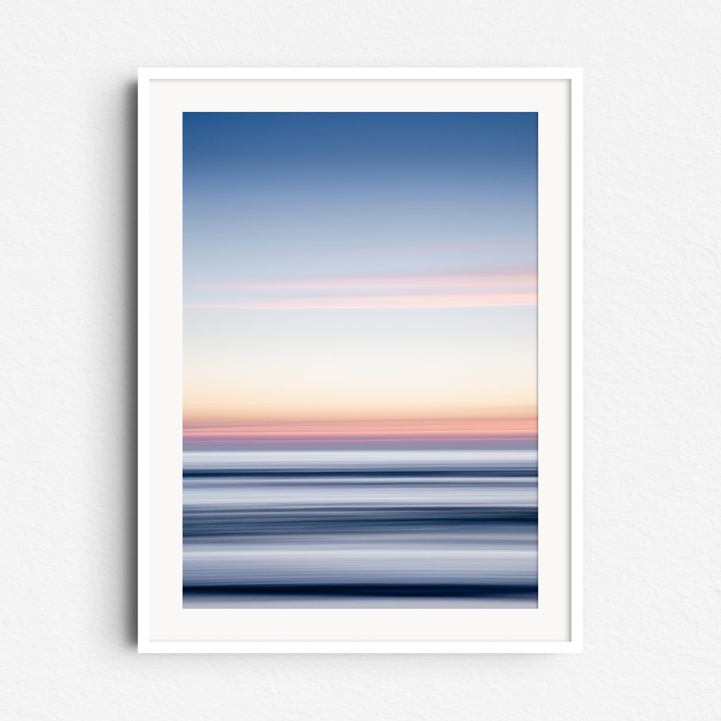 Abstract North Sea sunset in blue, yellow, and purple, framed in white wood. Perfect for serene, nature-inspired interiors.