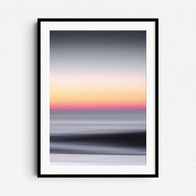 Load image into Gallery viewer, Abstract North Sea photo with contrasting shadows and orange hues, framed in black wood. A dramatic touch to modern wall decor.
