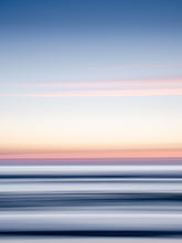 Load image into Gallery viewer, Abstract motion blur from the sea and sunset. Blue and orange sky and contrast rich surface of the sea, with stretched out lines using a long exposure photography technique.
