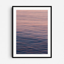 Afbeelding in Gallery-weergave laden, &quot;Surface&quot; – tranquil North Sea photo with soft blue and purple hues, framed in black wood. Perfect for minimalist coastal decor.
