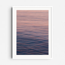 Afbeelding in Gallery-weergave laden, Pastel blues and oranges create a serene North Sea photo. Soft movement, framed in white wood for a calming, modern look.
