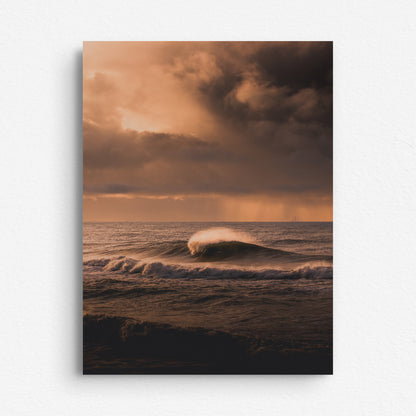 Big wave during a colourful sunset in The Netherlands, printed on dibond.