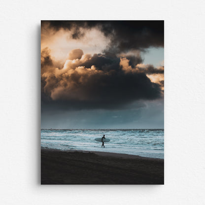 Orange clouds with a surfer underneath on the North Sea coast, surf art printed on aluminium dibond.