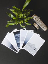 Load image into Gallery viewer, Set of six A6 postcards featuring snowy Scheveningen surf scenes, perfect for sending as a gift or framing.
